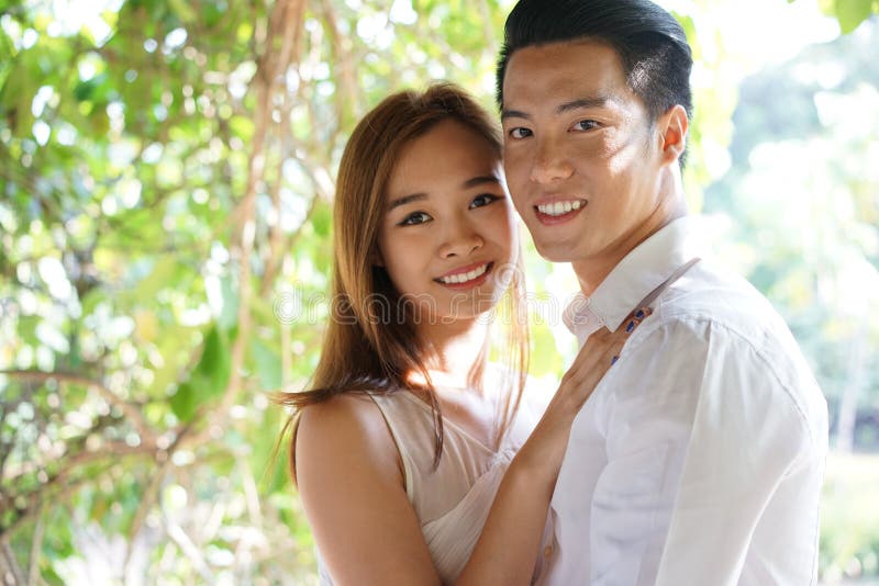 uniform asian Couple outdoor