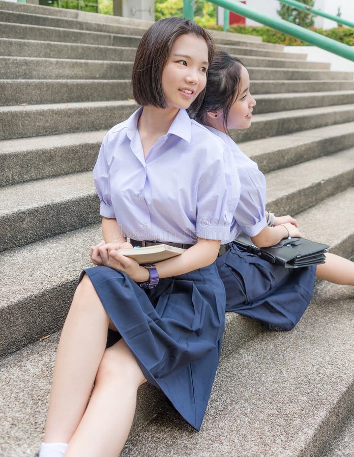 uniform asian Couple outdoor